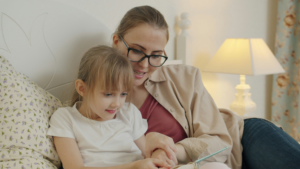 A parent reading to their child