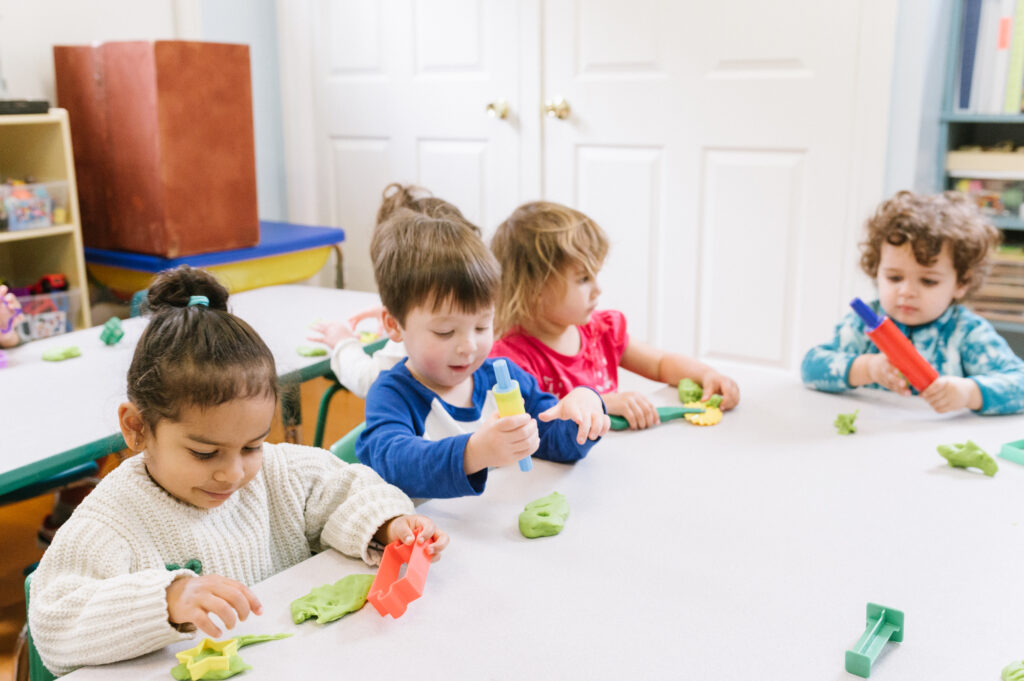 Kids playing with modeling clay