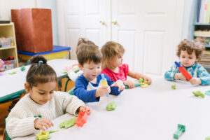 Kids playing with modeling clay