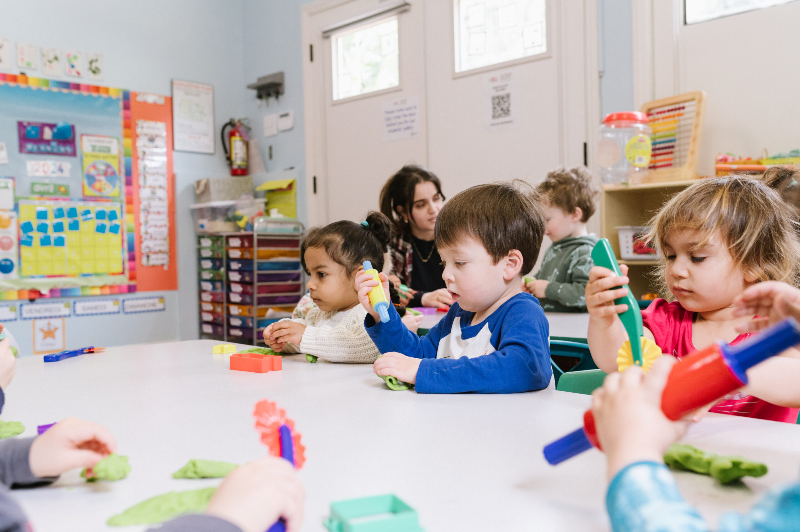 Kids playing with modeling clay