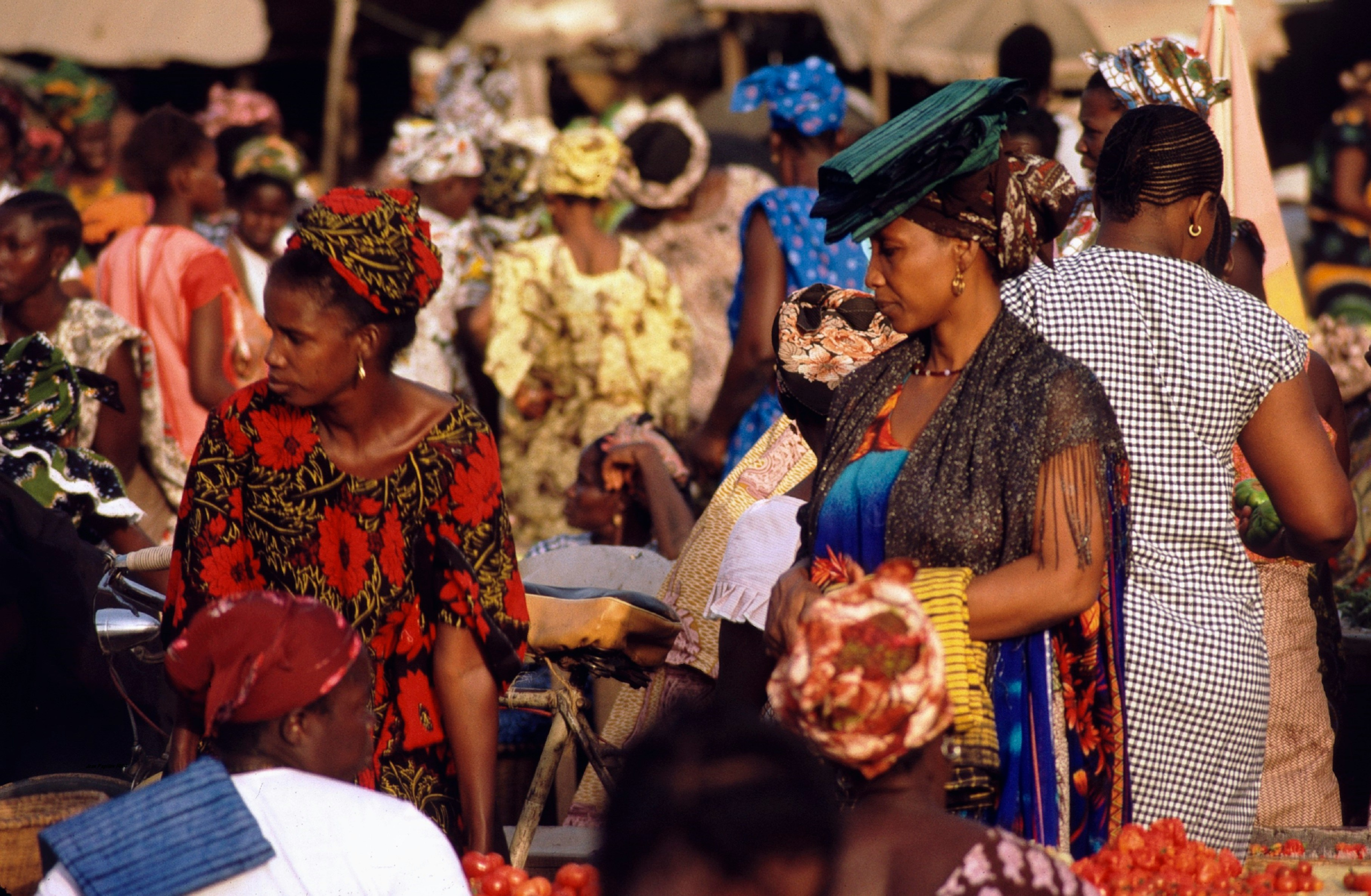 People sitting and chatting in a big outdoor area of Senegal